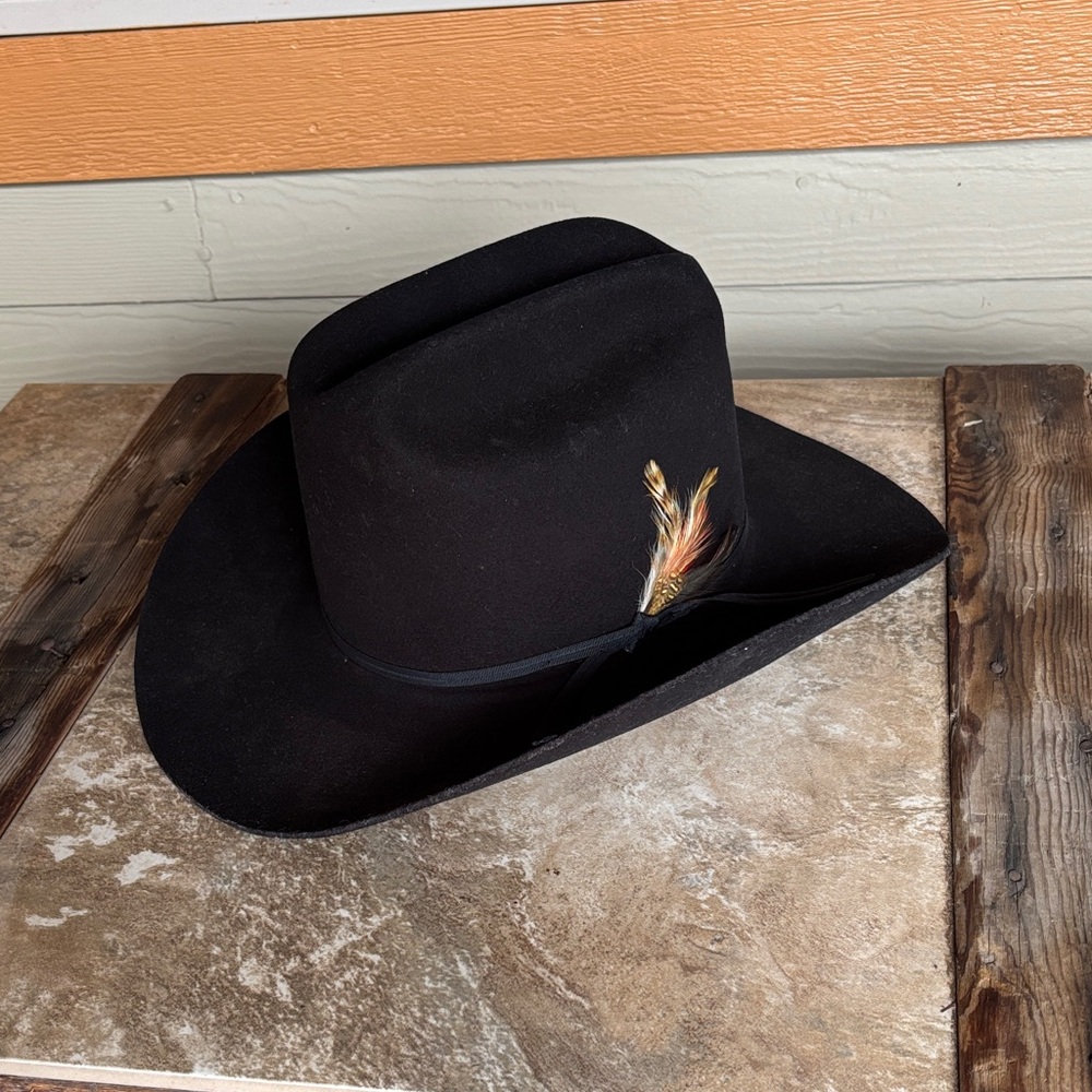 Women’s black cowgirl hat by Eddy Brothers.